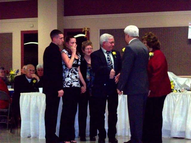 The Bellevou family receives the 10 years of service award for Raoul K. Denton, who sadly passed away on January 18, 2008.